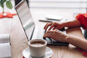 woman-typing-on-her-laptop-at-home-picjumbo-com